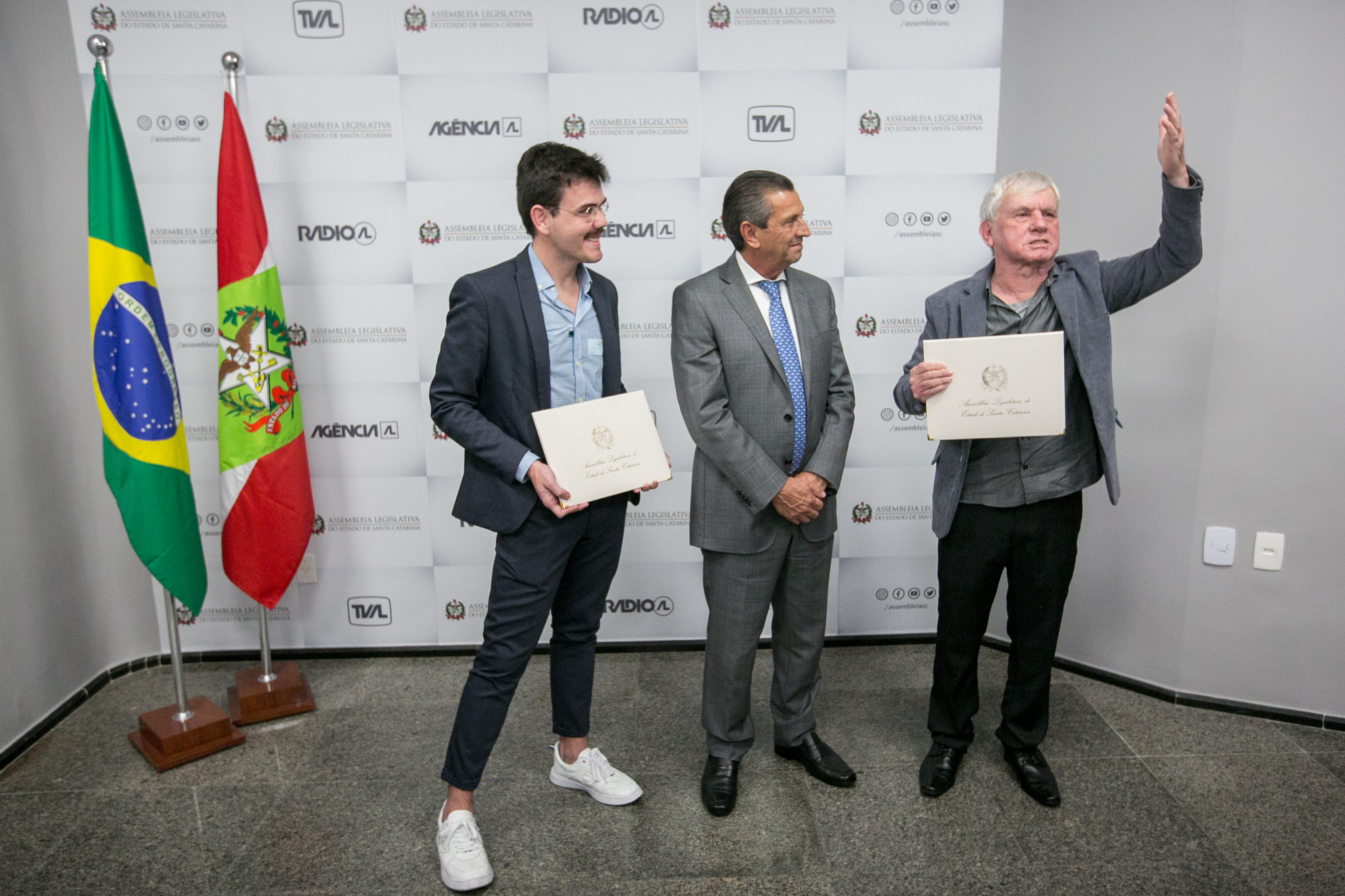 Colunista André Groh, 
Deputado Julio Garcia (PSD) e radialista Saulo Tavares