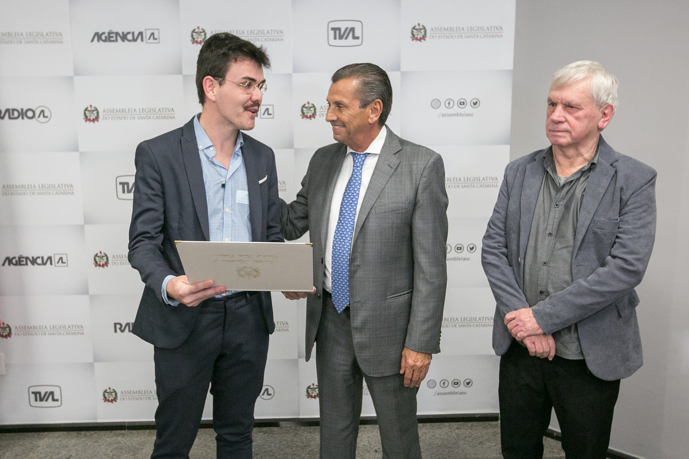 Colunista André Groh, 
Deputado Julio Garcia (PSD) e radialista Saulo Tavares